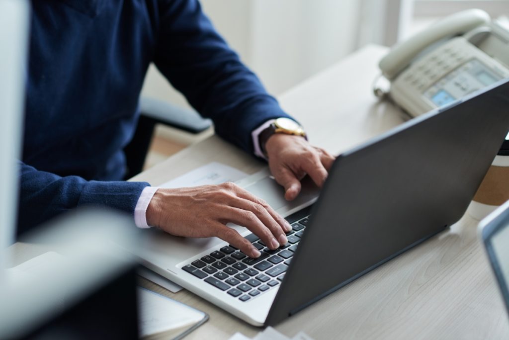 Employee work with laptop